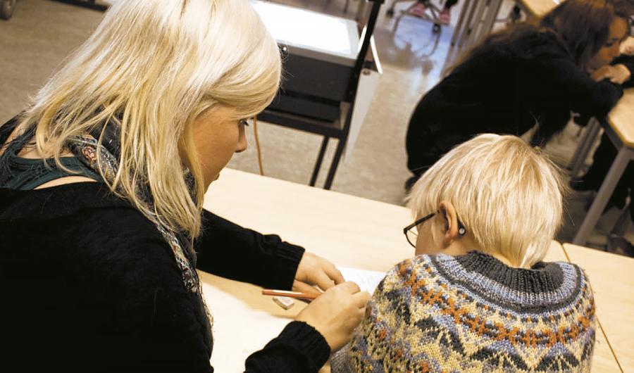 Elev som undervises av en lærer.