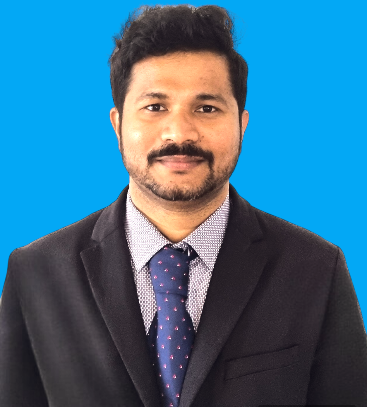 Portrettbilde av mann i dress.